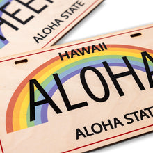 Load image into Gallery viewer, Hawaii license plate with rainbow design and 'Aloha' text on a white background
