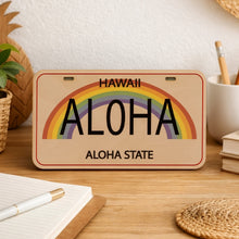Load image into Gallery viewer, Wooden sign with rainbow and 'Hawaii Aloha Aloha State' text on a desk with stationery items.
