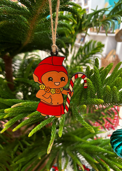 MENEHUNE CANDY CANE ORNAMENT