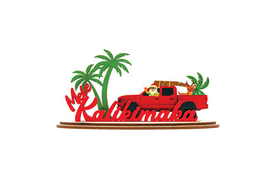 Decorative sign with a red truck, Santa Claus, and palm trees featuring 'Mele Kalikimaka' text.