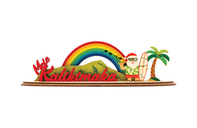 Decorative sign with a rainbow, palm tree, Diamond Head and tropical Santa Claus figure with 'Mele Kalikimaka' text.