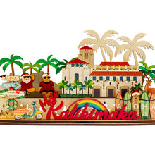 Load image into Gallery viewer, 3D sign of Honolulu Hale building with Shaka Santa and Mrs Clause characters and &#39;Aloha&#39; sign on a white background
